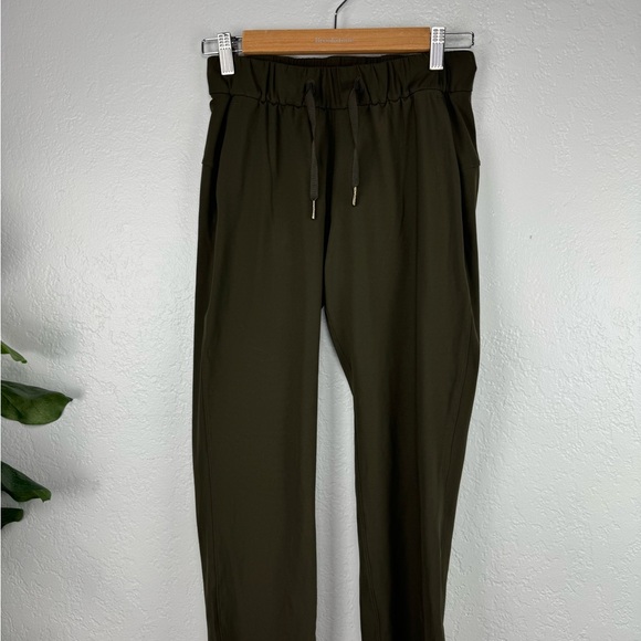 Lululemon On the Fly 7/8 Pant Woven Dark Olive Size 2 - Picture 2 of 8